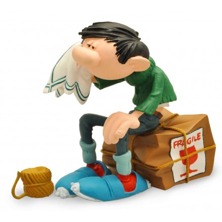 Figura de Coleccionista de Gaston sentado en Caja Frágil