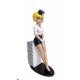 Figura de colección Plastoy Natacha sentada en una pila de cómics